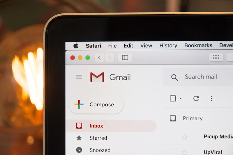 Laptop showing email inbox for license delivery